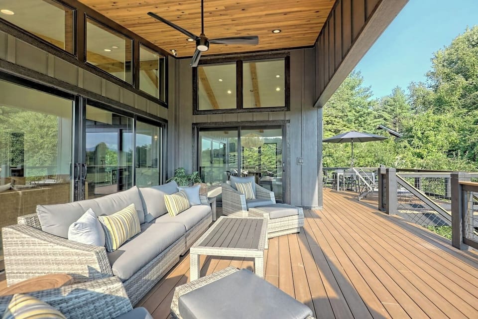 Lots of comfortable seating on the front deck for taking in the view as you sip your wine or, drink your beverage of choice