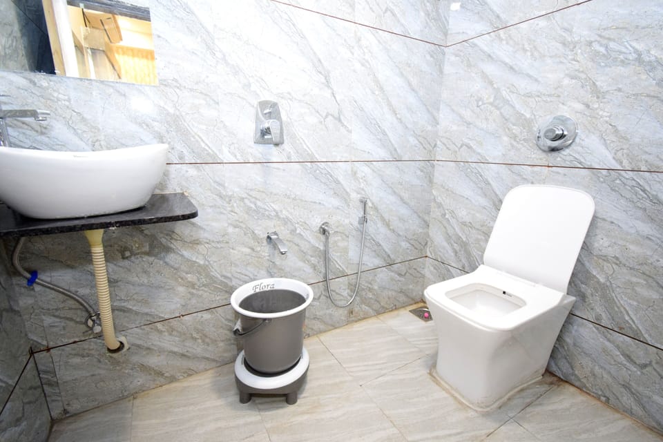 Deluxe Triple Room | Bathroom | Towels