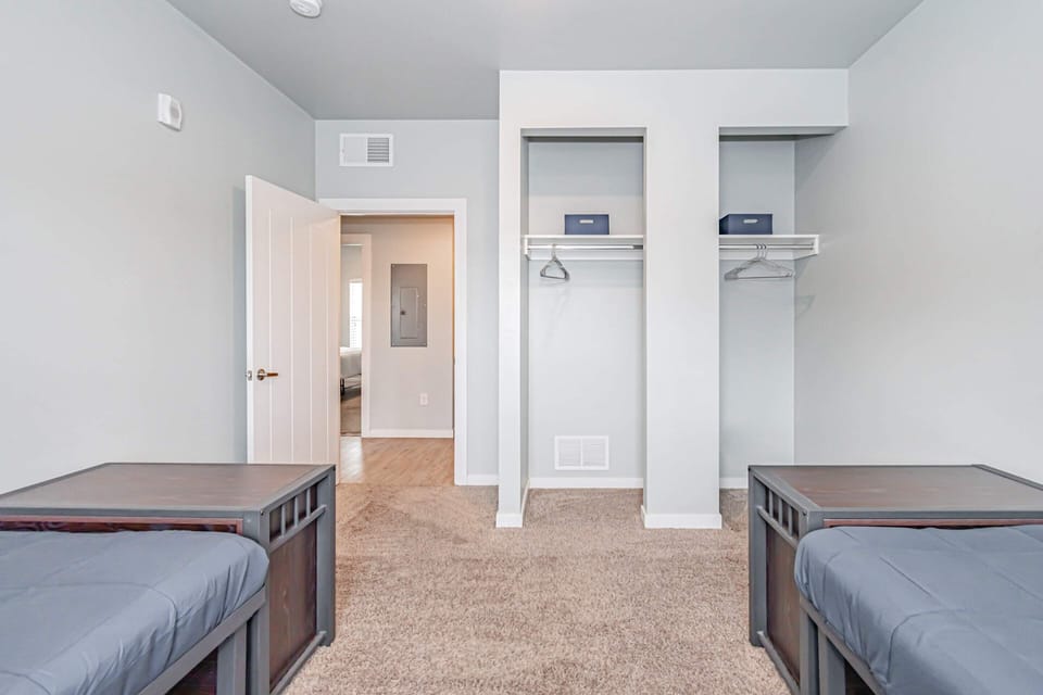 A closet for each guest in the room