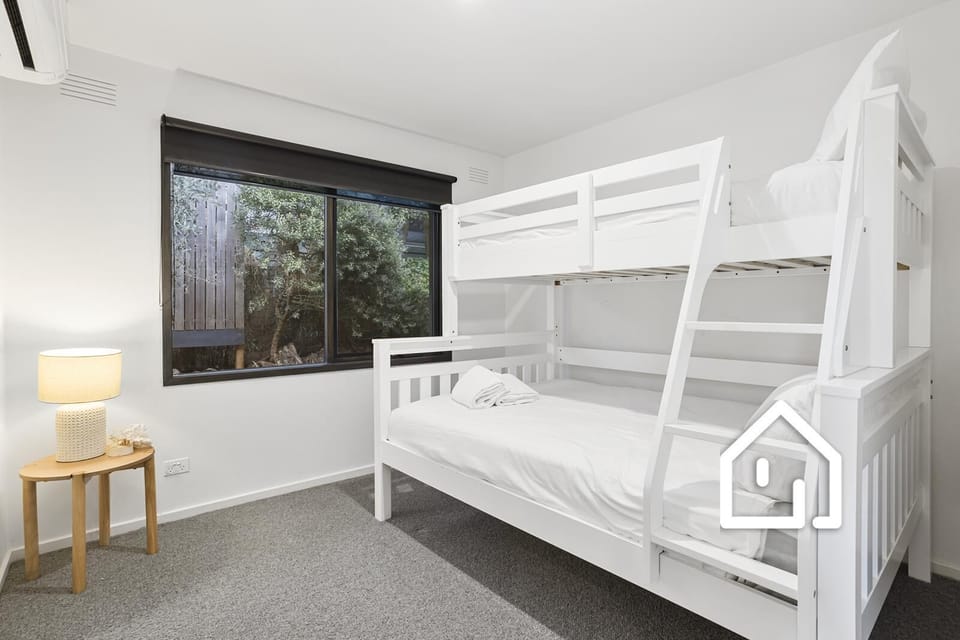 Bedroom 5 downstairs has a tri bunk - double on bottom/single on top