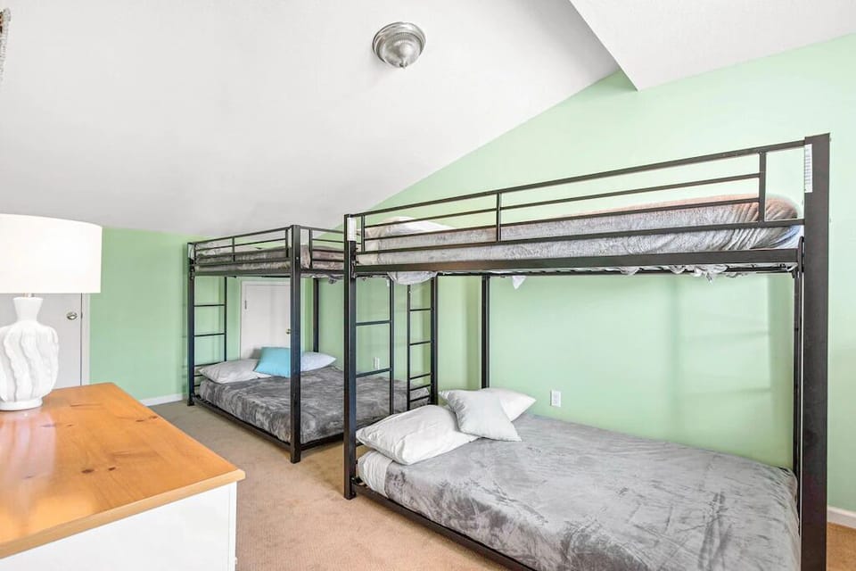 2 full over full bunks in this room.  Lower bunk is great for adults.  Top bunk for 1 Adult of 2 kids.