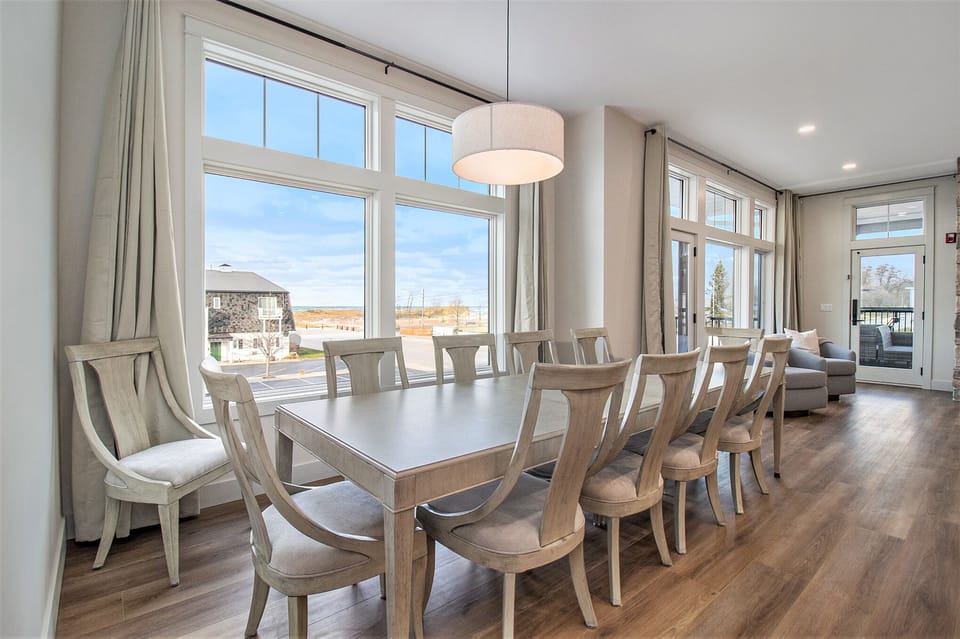 2nd floor dining room table and 12 chairs.