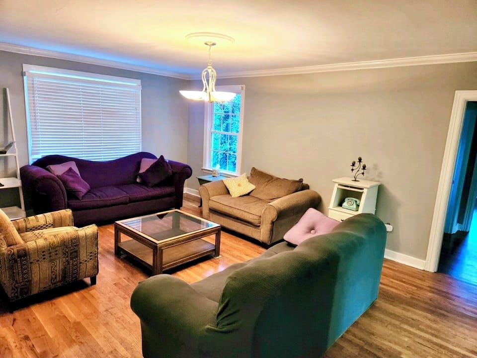 Plenty of seating in the living room. Smart TV has since been mounted.
