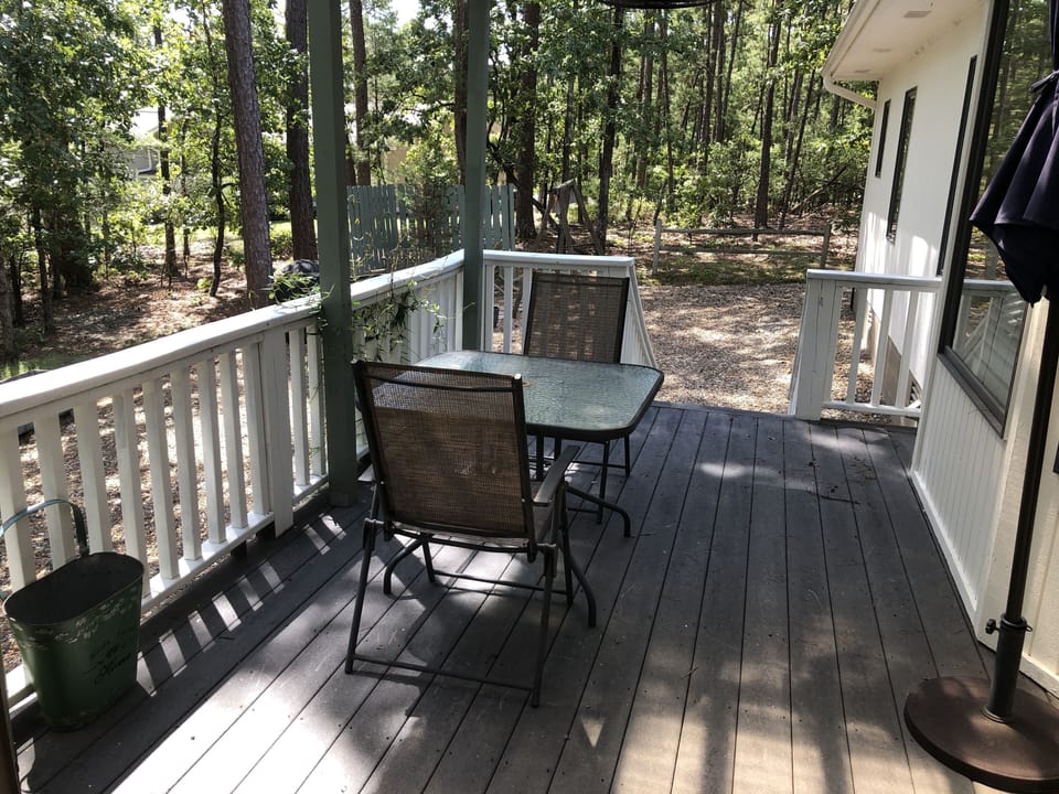 Private patio deck overlooking the yard.
