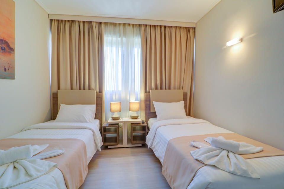 Family Suite, 2 Bedrooms, City View | Select Comfort beds, in-room safe, desk, soundproofing