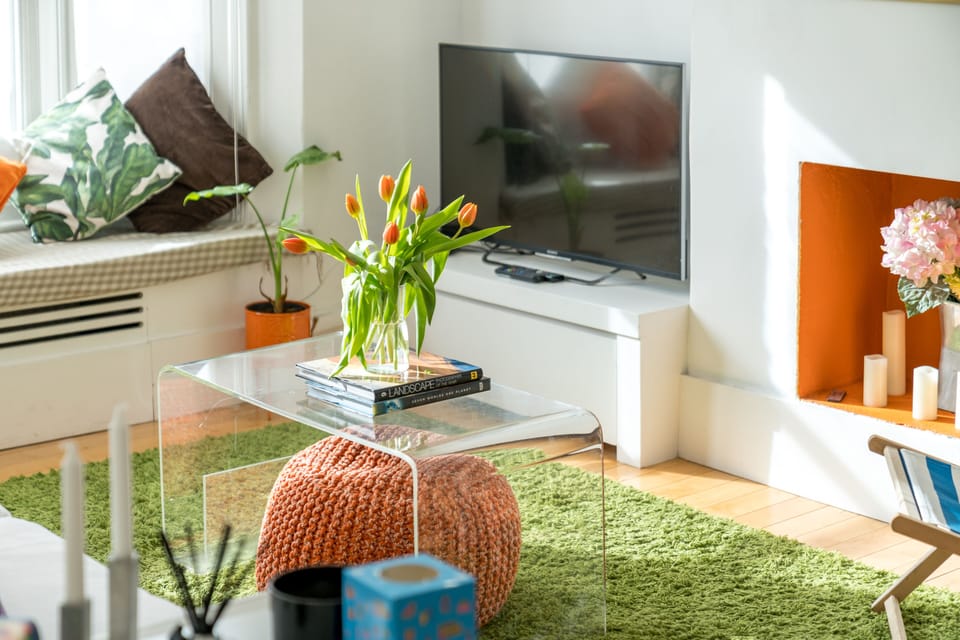 Apartment, 2 Bedrooms | Living area | 24-inch TV with cable channels