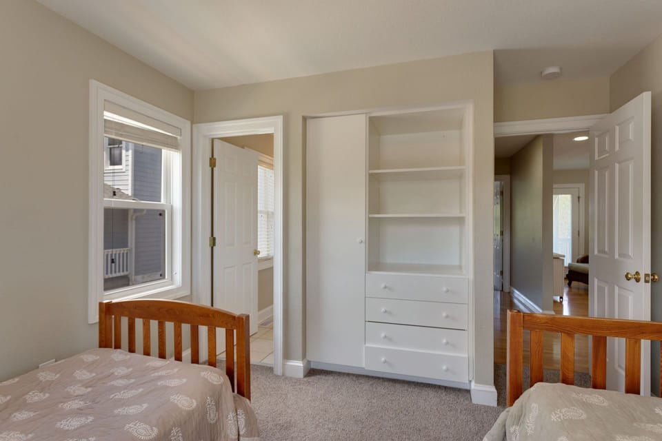 Catch some z's in one of the Mid-Level Master Twin Bedrooms with an attached bathroom!