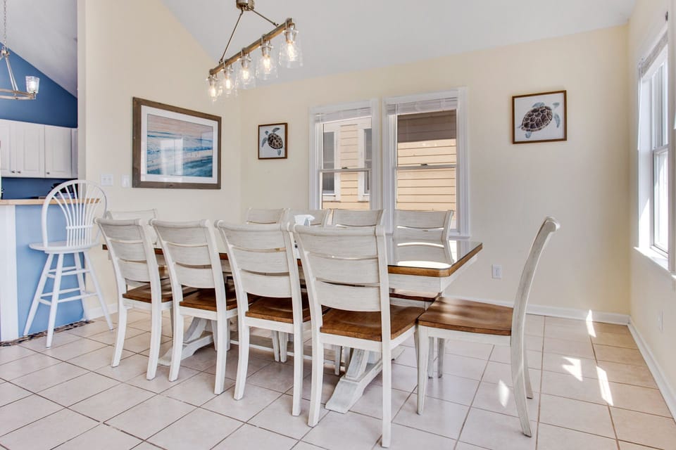 Eat together beneath spacious, cathedral ceilings in the Dining Area with seating for 8.