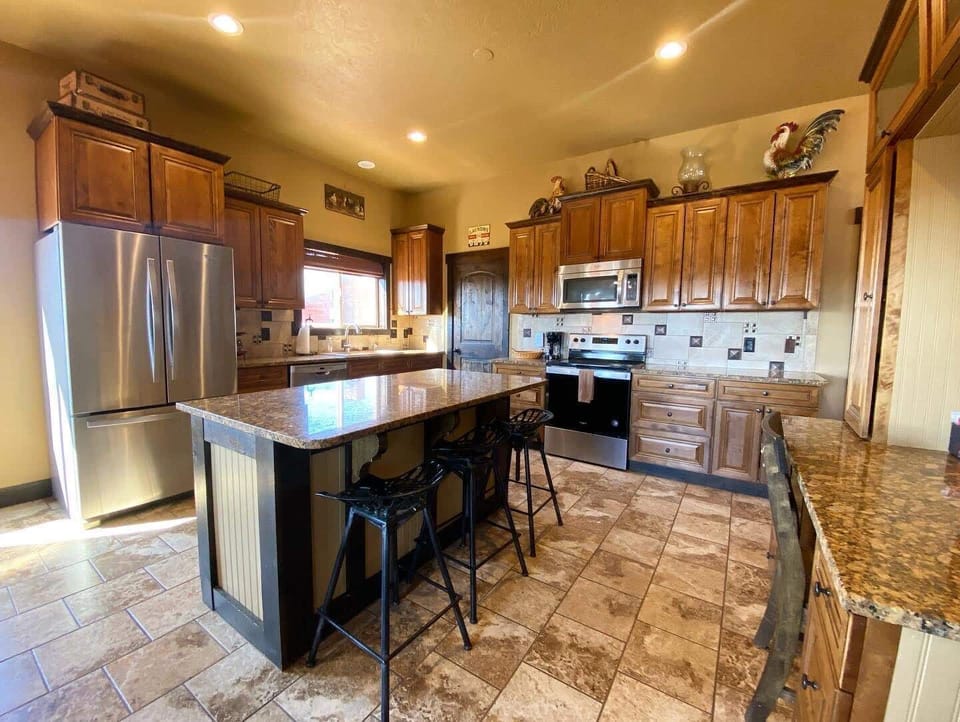 Effortlessly prepare delicious meals in our gourmet kitchen, equipped with everything you need.