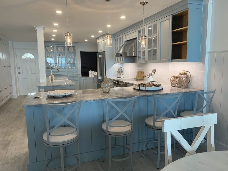 Newly renovated kitchen with stools that rotate 360 degrees