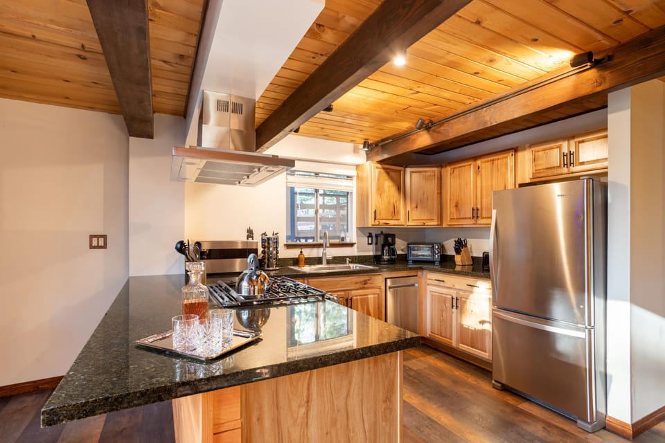 Modern kitchen with a gas stove.