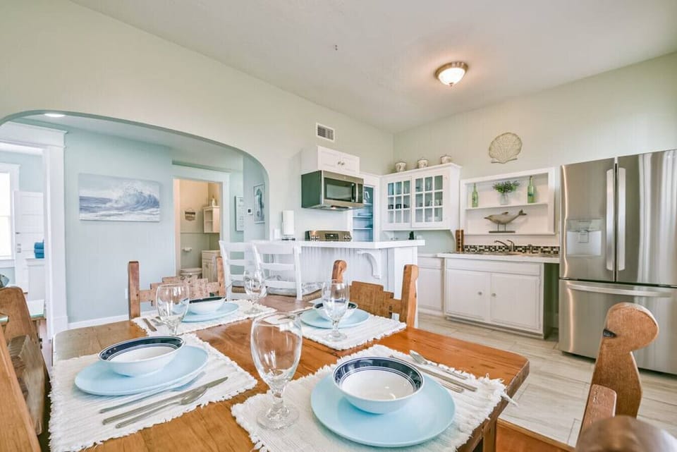 Lovely wooden dining table with seating