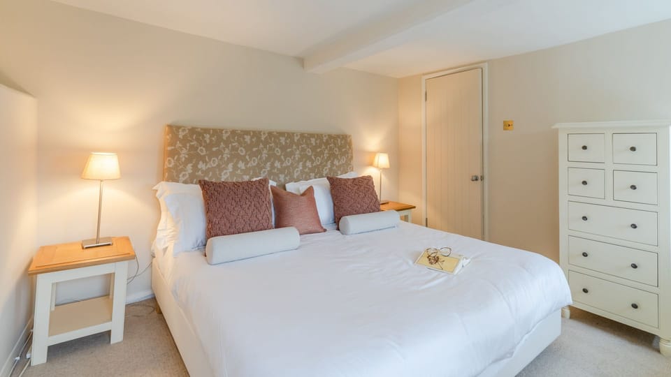 Bedroom One is a beautifully serene place to retreat to at night, Christmas Cottage.