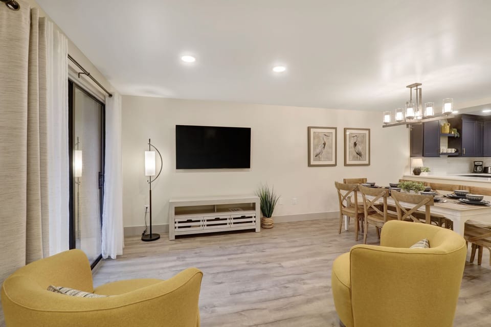 Xanadu A8 - Living and Dining Area - Plenty of space to watch the new 60" TV in this beautiful living area.