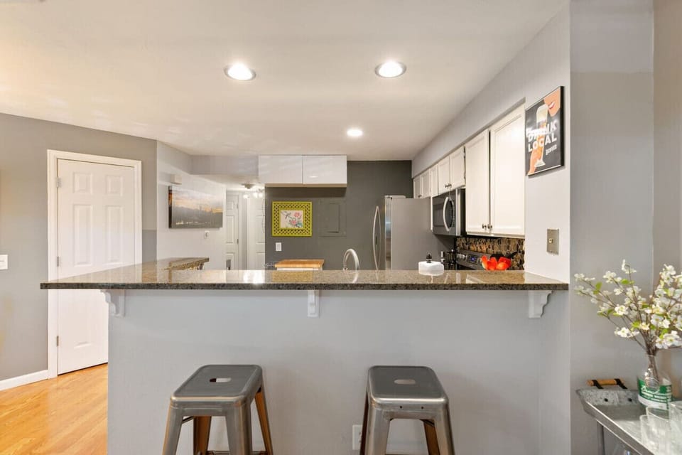 Plenty of counter space for meal prep with a bright dining space.