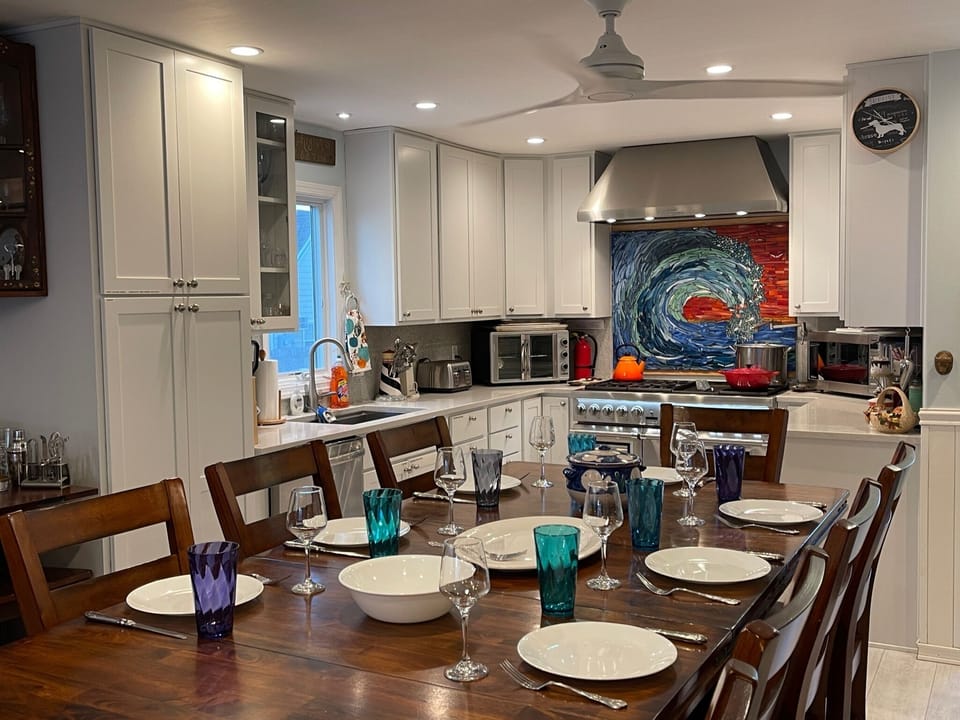 Our guests love the kitchen and dining room set up when they are cooking.  The room is very inviting and lets everyone be part of the preparation and fun.