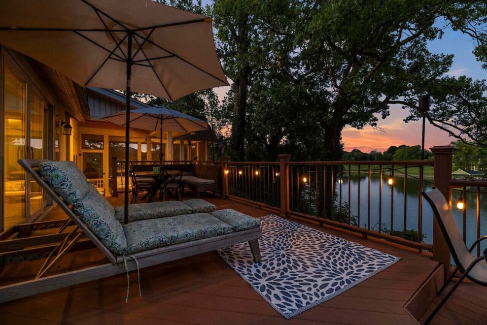 Spacious outdoor deck perfect for dining, lounging, or watching the sunset over the lake.