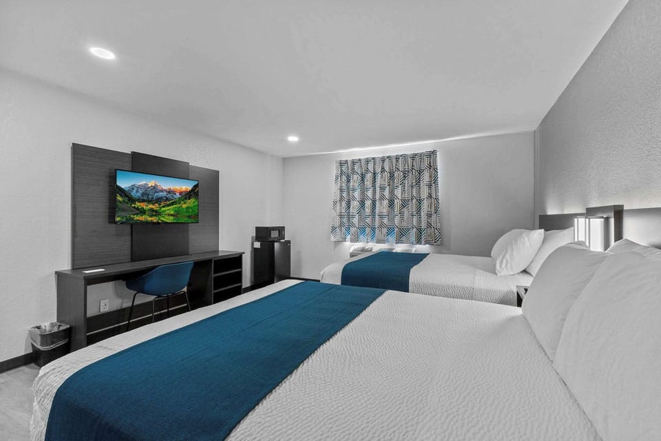 Desk, laptop workspace, free WiFi, bed sheets