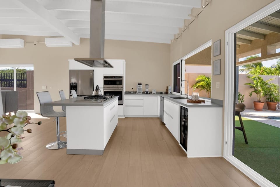 Equipped with modern appliances and ample counter space, this kitchen is perfect for cooking up delicious meals and entertaining guests.