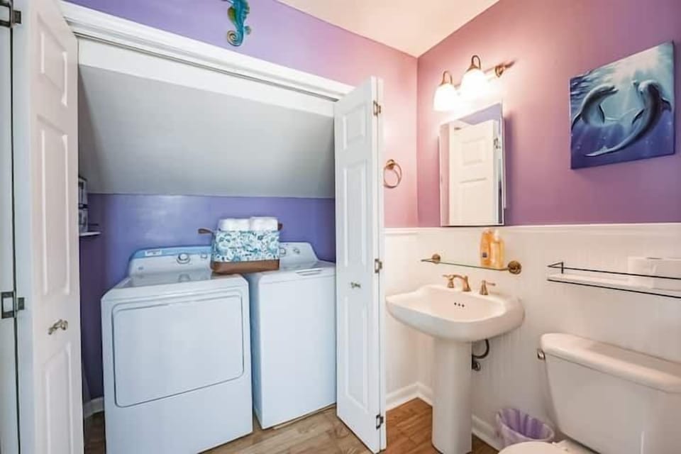 Bathroom with washer and dryer