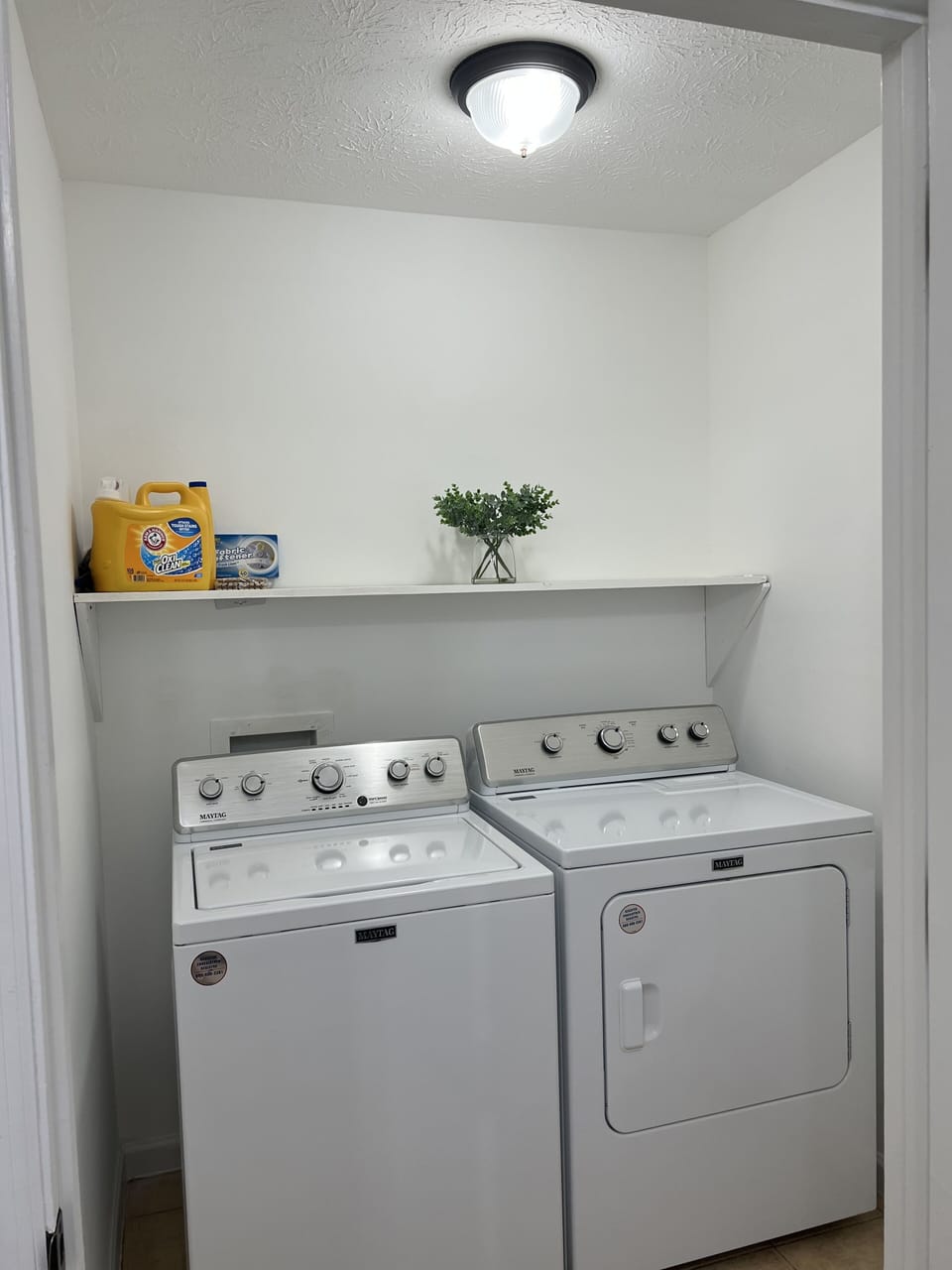 Laundry room with a detergent free to use for free. 