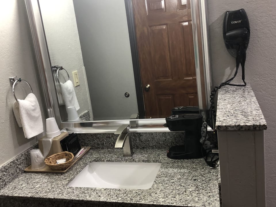Down comforters, desk, iron/ironing board (on request), WiFi (free)