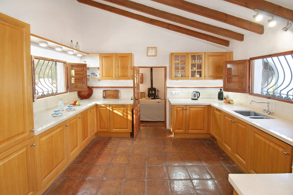 From the salon you can walk into the fully equipped kitchen.