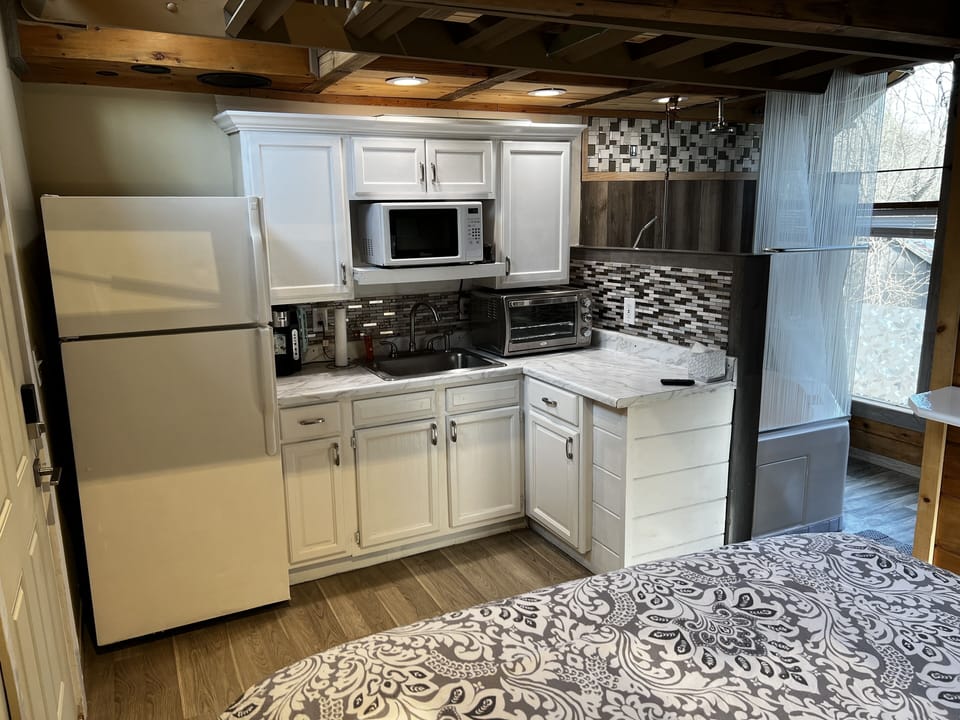 Full kitchen, twin burner in cabinet.