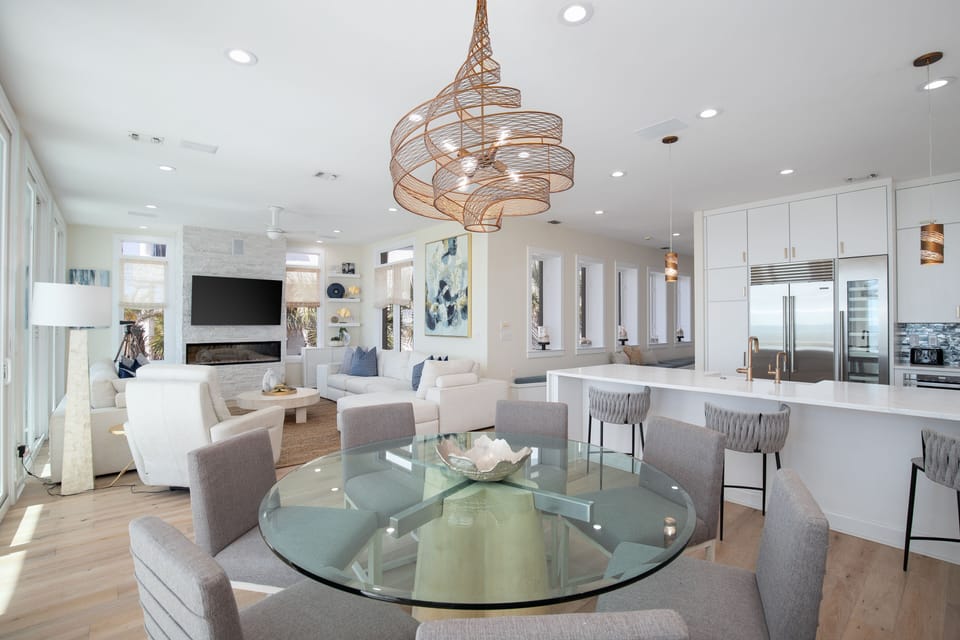Pull up a chair and stay a while. The dining table is where the whole group comes together. Fresh seafood, great conversation, and the kind of unhurried meals that only happen on vacation.