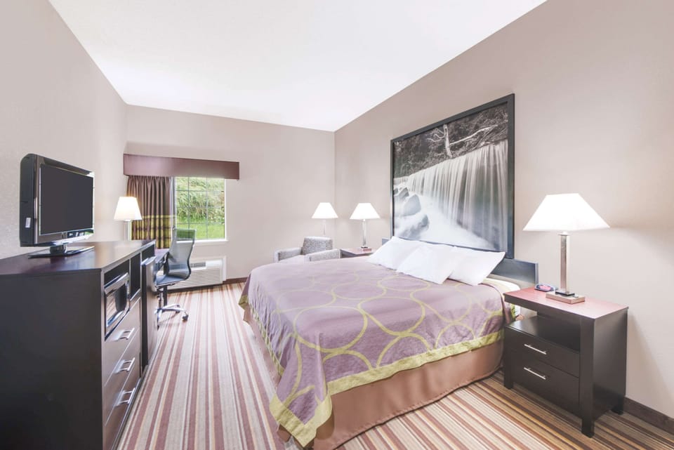 Desk, blackout drapes, iron/ironing board, free cribs/infant beds