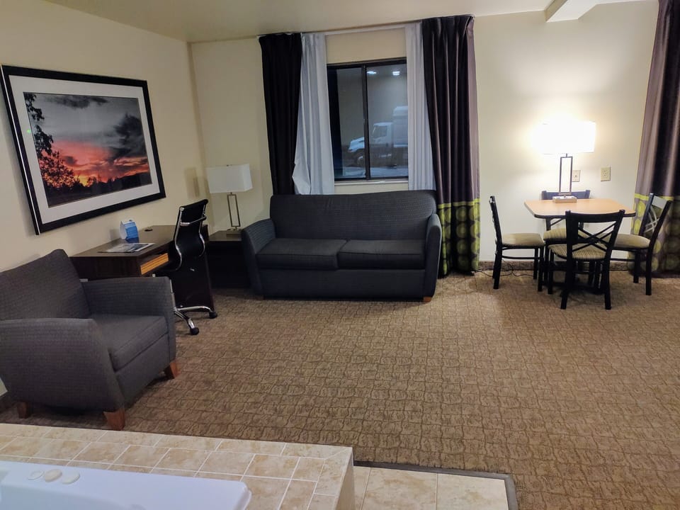 Superior Studio Suite, 1 King Bed, Non Smoking | Living area | 50-inch flat-screen TV with satellite channels, TV