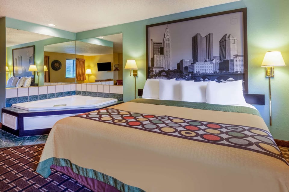 Studio Suite, 1 King Bed, Non Smoking, Jetted Tub | In-room safe, desk, laptop workspace, blackout drapes