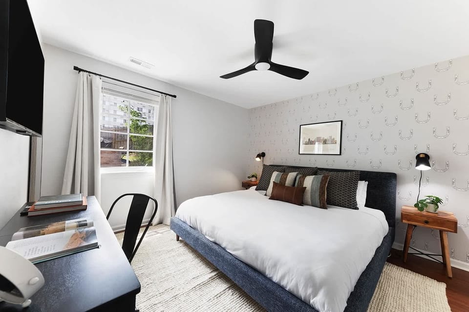 Immaculate Bedroom with Luxury Linens and Cozy Touches