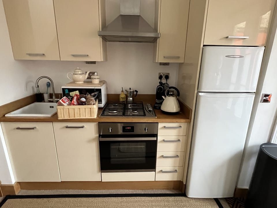 Kitchen with dishwasher microwave,  air fryer, Nespresso all crockery cutlery