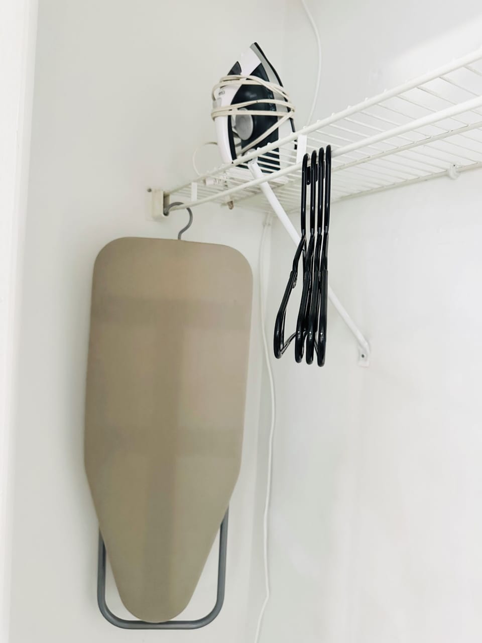 Iron, Ironing Board, Hangers and closet space