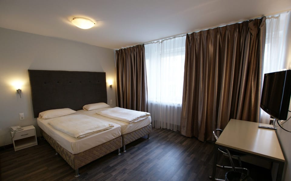 Double or Twin Room | In-room safe, desk, rollaway beds, free WiFi