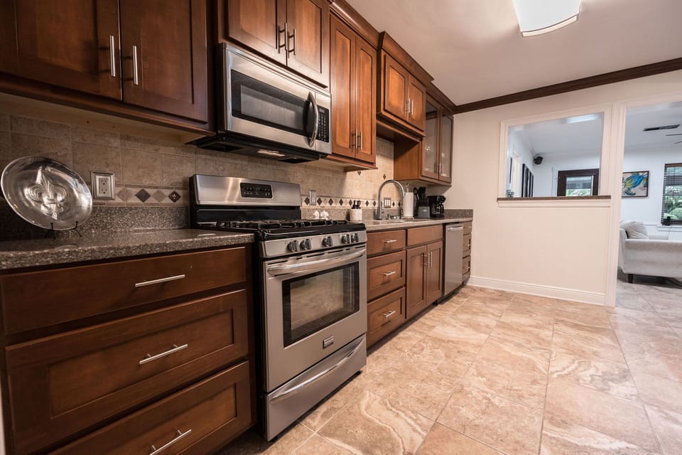 Full kitchen equipped with all basic cooking and dining necessities