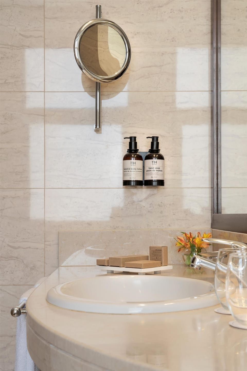Deep soaking tub, rainfall showerhead, eco-friendly toiletries