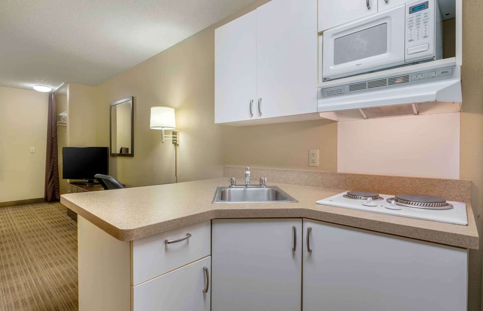 Studio, 1 King Bed, Non Smoking | Private kitchen | Fridge, microwave, stovetop, coffee/tea maker