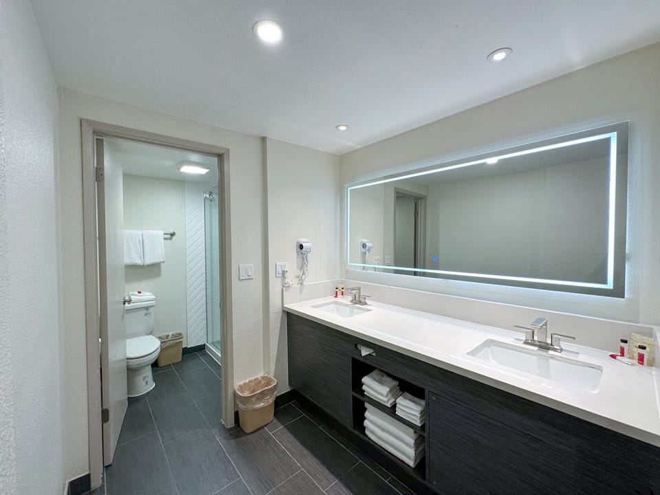 Room, Non Smoking (2 Queen Beds & 1 Bunk Bed) | Bathroom | Free toiletries, hair dryer, towels