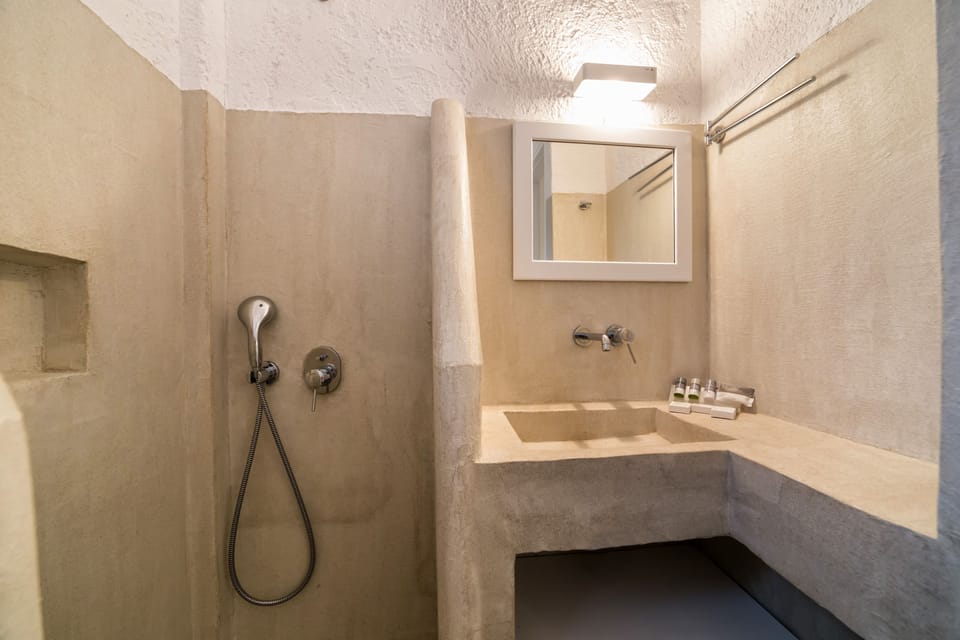 Shower, free toiletries, hair dryer, slippers