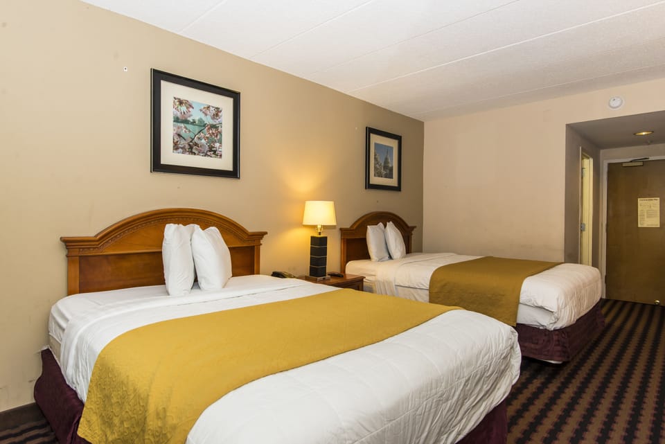 Standard Room, 2 Queen Beds | Desk, laptop workspace, blackout drapes, free WiFi