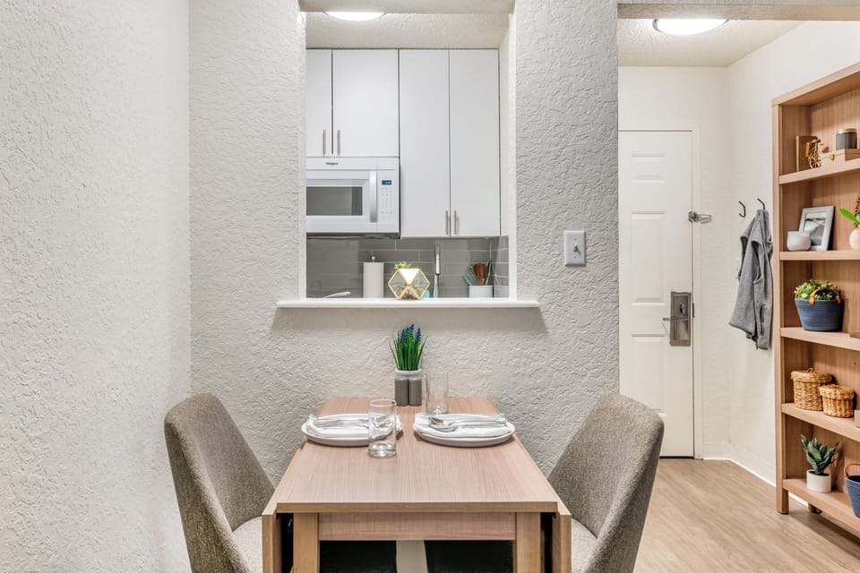 Fridge, microwave, stovetop, dining tables