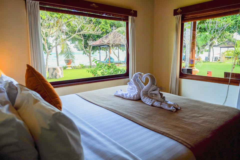 Deluxe Beach Front Villa | Minibar, in-room safe, desk, iron/ironing board