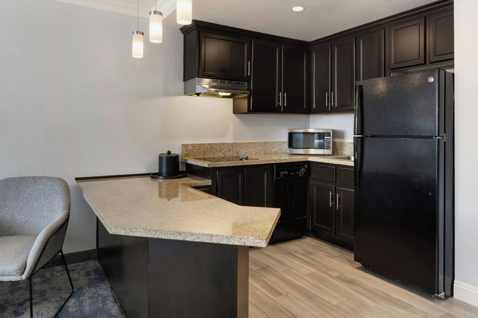 Suite, 1 Bedroom, City View | Premium bedding, in-room safe, desk, iron/ironing board