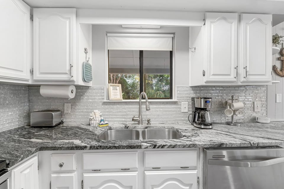 Fully equipped kitchen with everything needed for easy family meals and beachside breakfasts.