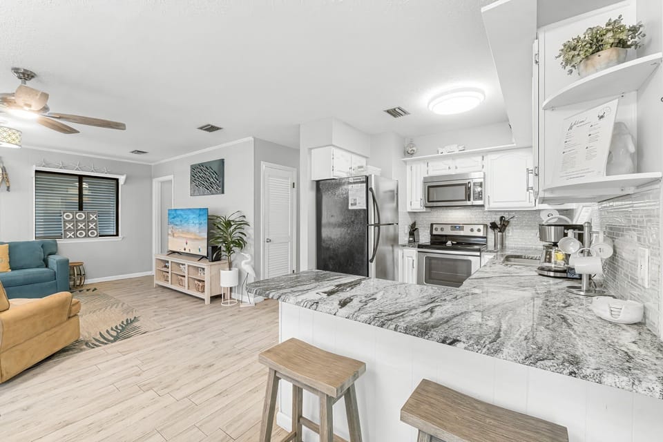 Comfortable living room with plenty of seating — perfect for relaxing after beach days.