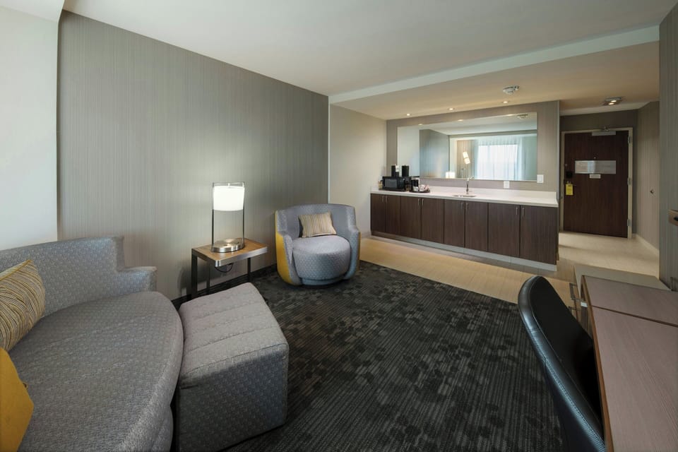 Suite, 1 King Bed with Sofa bed | Living area | 55-inch flat-screen TV with satellite channels, TV, Netflix