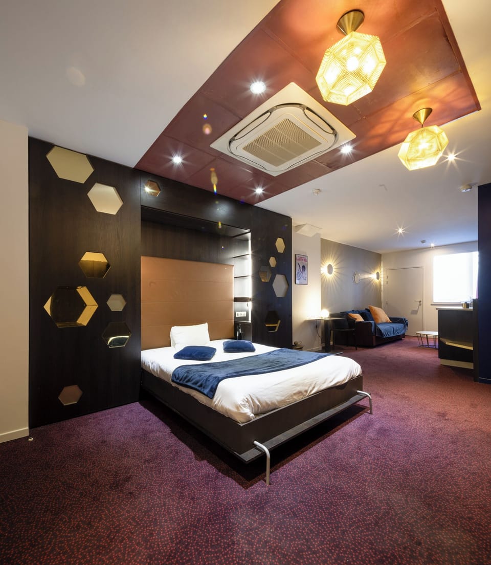 Deluxe Quadruple Room | Premium bedding, desk, laptop workspace, soundproofing