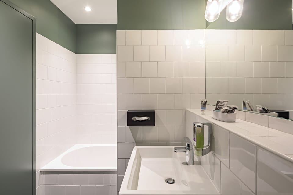 Designer toiletries, hair dryer, towels